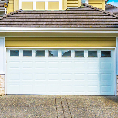 Top Signs Your Garage Door Needs Repair This Summer